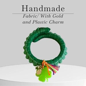 Green Fabric Bracelet with Gold and Plastic Charm